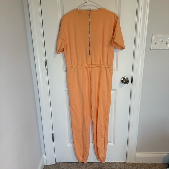 Pretty Little Things Peach Short Sleeve Jump Suit Romper Timber Size 8 - Picture 3 of 3